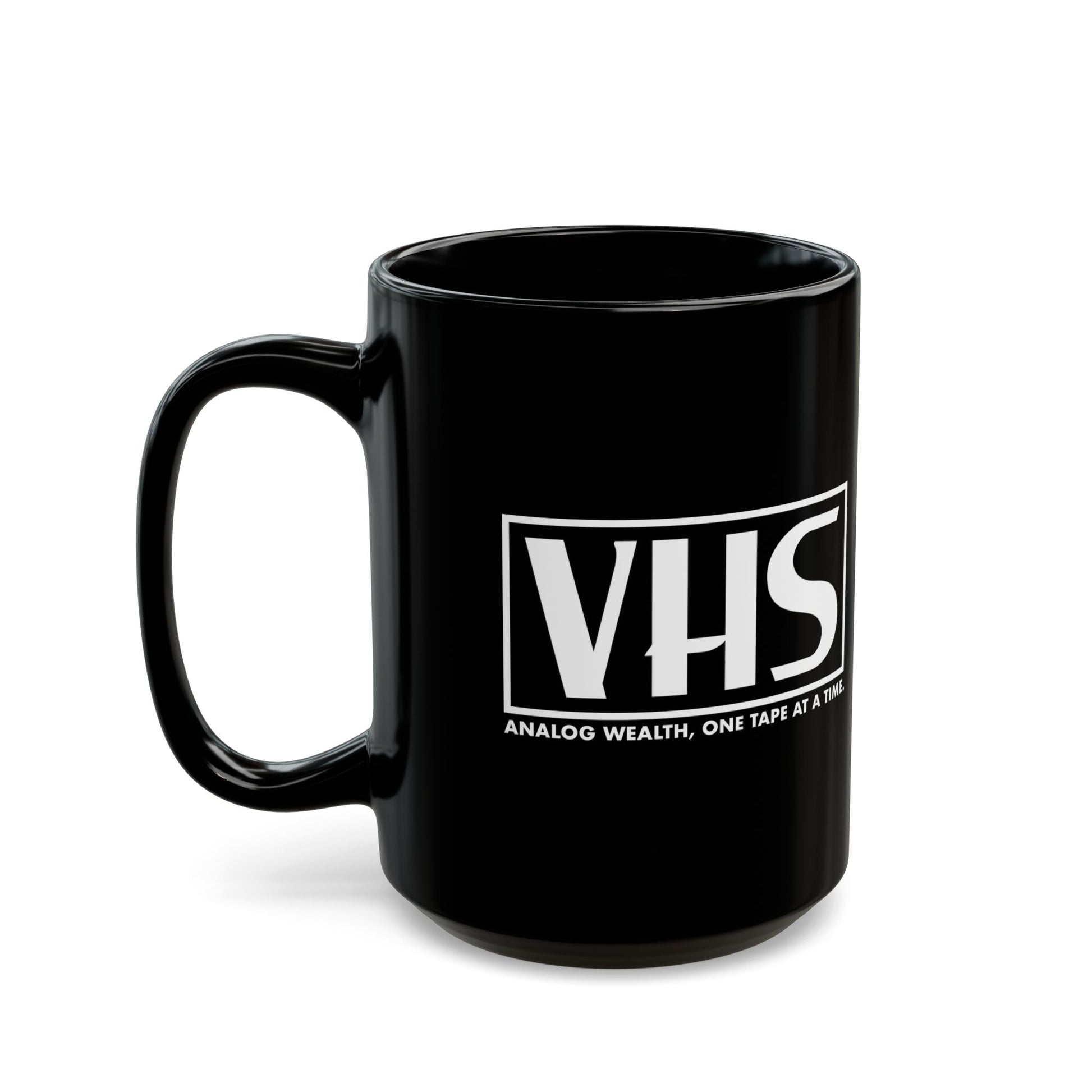 black coffee mug featuring VHS analog wealth design in white
